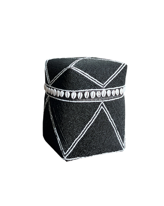 Black geometric-patterned box with white accents on a white background