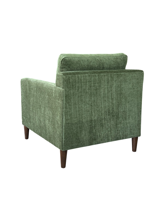 Green armchair on a white background