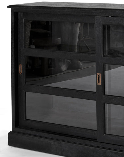 Black wooden cabinet with glass panels on a white background